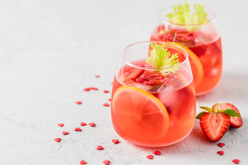 Sweet romantic St Valentines day strawberry lemon drink. Selective focus, space for text.