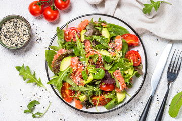 Salmon salad on white top view.
