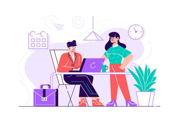 Young man is sitting at a desk with computer