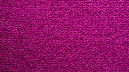 Bright purple background with texture.