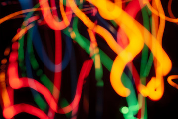 Blue, orange, red, green and yellow color magic light lines. Abstract pattern for light overlay background. Art tool texture based on particles, night party or shutter bulb motion effect in speed.