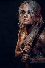 Naked Fantasy woman warrior wearing rag cloth stained with blood and mud in the heat of battle....