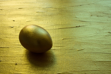 Burger with spinach, fish and poached egg, with a fresh roll with marzipan close-up against a brick wall with copy space