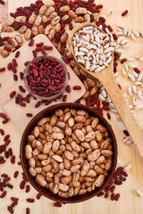 Haricot grains of different varieties: white, red, brown, spotted, large and small. Vegetarian food containing a large amount of vegetable protein, vitamins of group B.