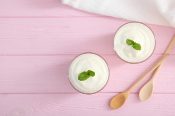 Natural white yogurt on the table. Healthy snack, Greek yogurt.