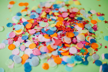 Fototapeta na wymiar Colored confetti background. Texture colored circles.