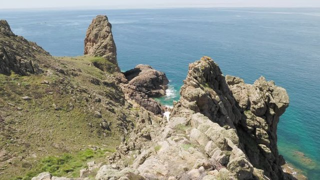Le Pinacle is a protruding pinnacle of rock, at the coastal edge of Les Landes in the north-west of Jersey