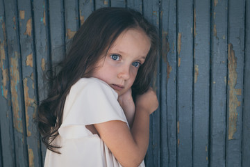 Fototapeta premium Portrait of sad little girl