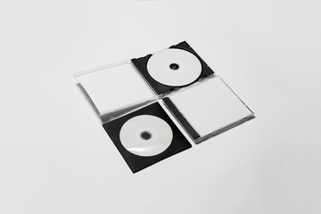 Open and close compact plastic disc box case set with white isolated blank for branding design. CD jewel mock-up on soft gray background. DVD or CD disc