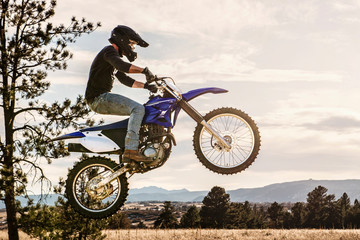 Young Man Dirt Biking in the Foothills in Colorado