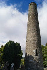 Fototapeta na wymiar The Round Tower in Glendalough in Ireland