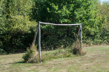 Old wooden goal football door on countryside football field