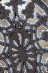 detail of a garden chair wiht hoarfrost