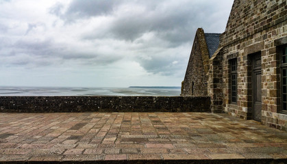 Fototapeta premium view on a low tide from the castle of mont saint michel