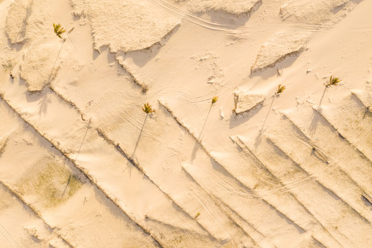 Aerial view of sand on the beach, Taiba, S&bdquo;o Gon&Aacute;alo do Amarante, Cear&middot;, Brazil
