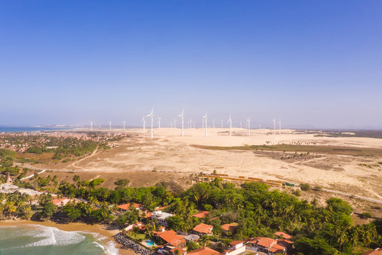Aerial view of the beach shore with windmills in the background, Taiba, S&bdquo;o Gon&Aacute;alo do Amarante, Cear&middot;, Brazil