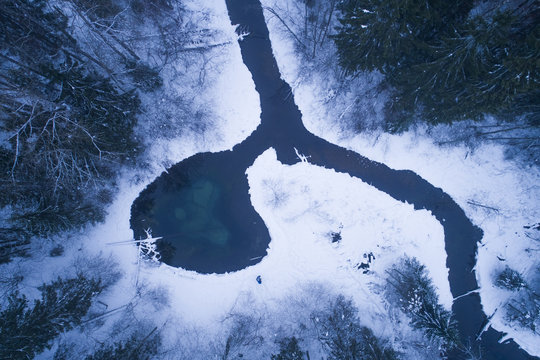 Aerial view of a water spring surrounded by snow Siniallikad Saula, Harju County, Estonia