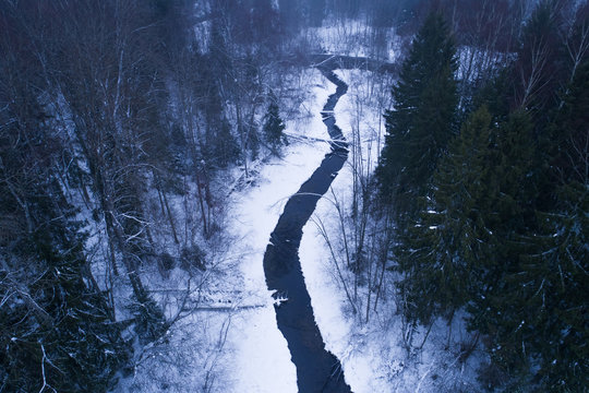 Aerial view of a water spring surrounded by snow Siniallikad Saula, Harju County, Estonia