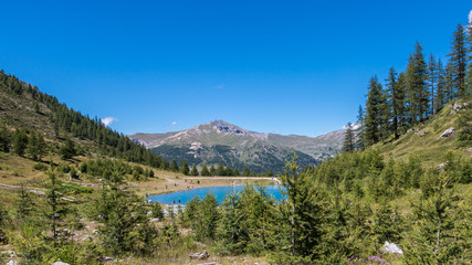 Fototapeta na wymiar Panorama montagne in alta Val Susa - Piemonte - Italy - Laghetto sopra Sestriere - La diga