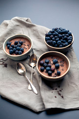 Fototapeta na wymiar Chocolate mousse with blueberries