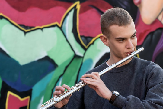 High school jazz band musician playing transverse flute
