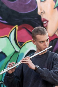 High school jazz band musician playing transverse flute