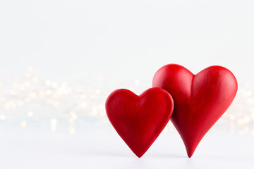 Fototapeta na wymiar Red hearts on grey background. Valentines daz greeting cards.