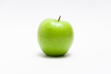 Green apple on the white background