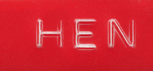HEN label made with red embossing tape