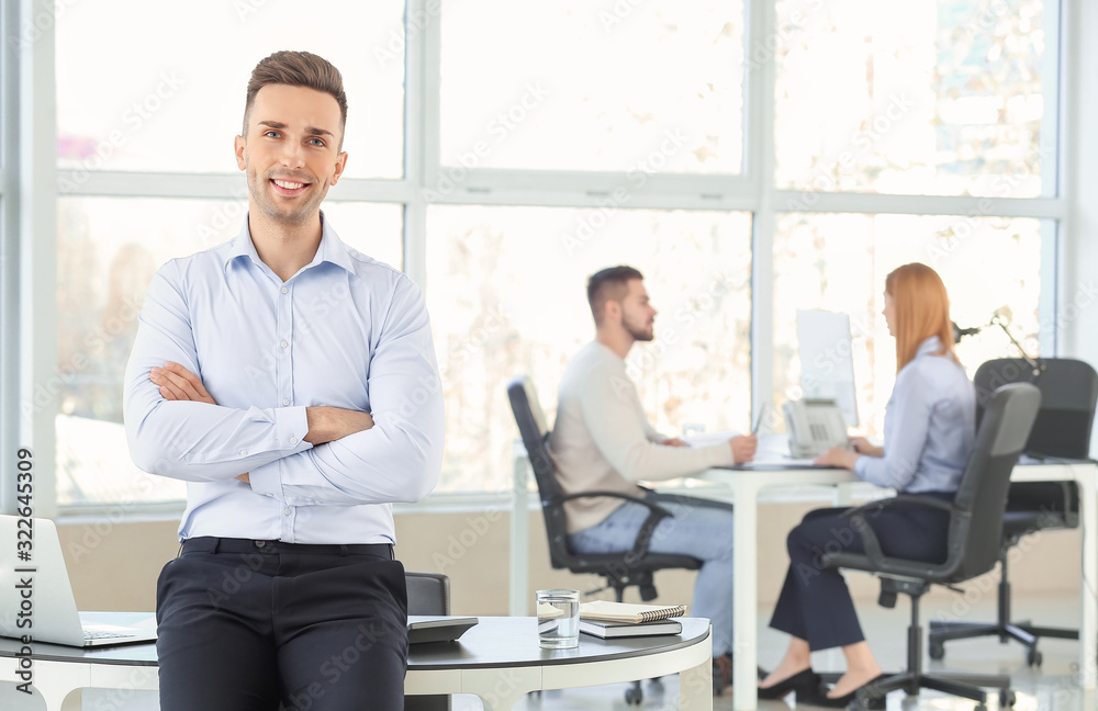 Wall mural portrait of young bank manager in office