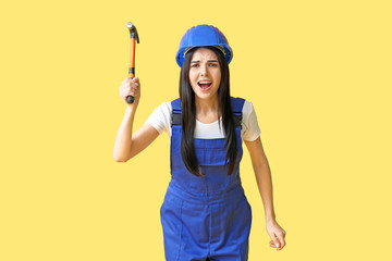 Female worker against color background. Concept of feminism