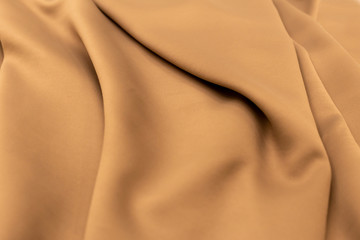 Obraz premium close-up of elegant beige fabric