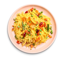 Plate with tasty pasta and vegetables on white background