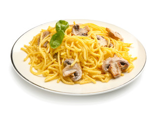 Plate with tasty pasta and mushrooms on white background