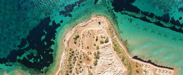 Obraz premium Aerial drone ultra wide top down photo of archaeological site of Temple of Apollo in island of Aegina, Greece