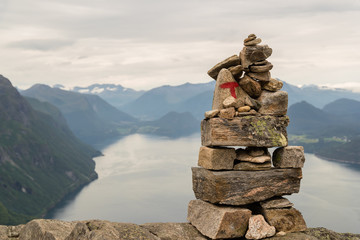 AANDALSNES, NORWAY - 2018 AUGUST 02. The red T sign marked the hiking pat in the mountain of Norway