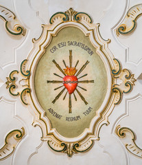 Fototapeta na wymiar Jesus heart fresco from the ceiling of the Church of Santa Maria della Purità in Martina Franca, province of Taranto, Apulia, southern Italy.