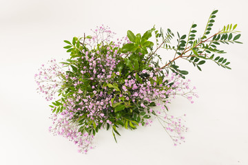 decorated bouquet of small pink flowers gypsophila. wedding decoration card.