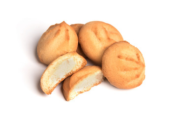 Cookies with milk filling in a cut isolated on a white background.