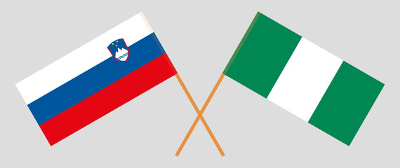 Crossed flags of Nigeria and Slovenia