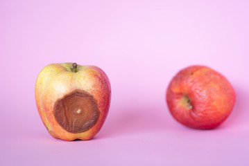 Wilted rotten and wrinkled apple.