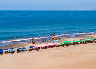 Umbrellas at Agua dulce Beach, in Lima, Peru.