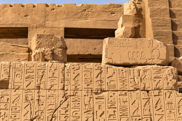 Luxor Governorate, Egypt, Karnak Temple, complex of Amun-Re. Embossed hieroglyphics on columns and...