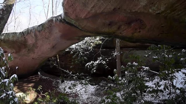 Pan of Natural Stone Bridge at Pickett CCC Memorial State Park in Winter