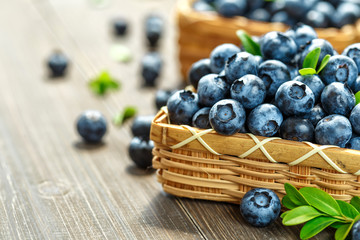 Fresh blueberries background with copy space for your text. Blueberry antioxidant organic superfood in a bowl concept for healthy eating and nutrition