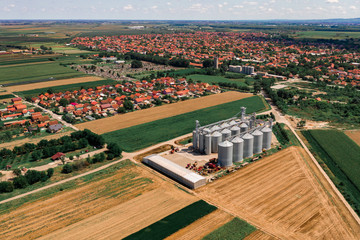 Fototapeta na wymiar Aerial view of agricultural silo from drone pov