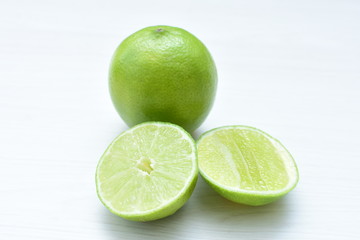 Tahiti lemons, whole and sliced