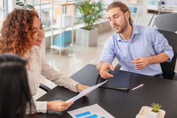 Human resources commission interviewing man in office