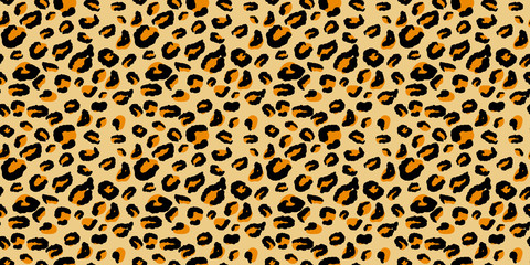 Leopard seamless pattern. Animal pattern in yellow, black and orange color.