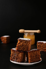 Traditional sweet honey pie on Rosh hashanah jewish New Year holiday , on a dark background